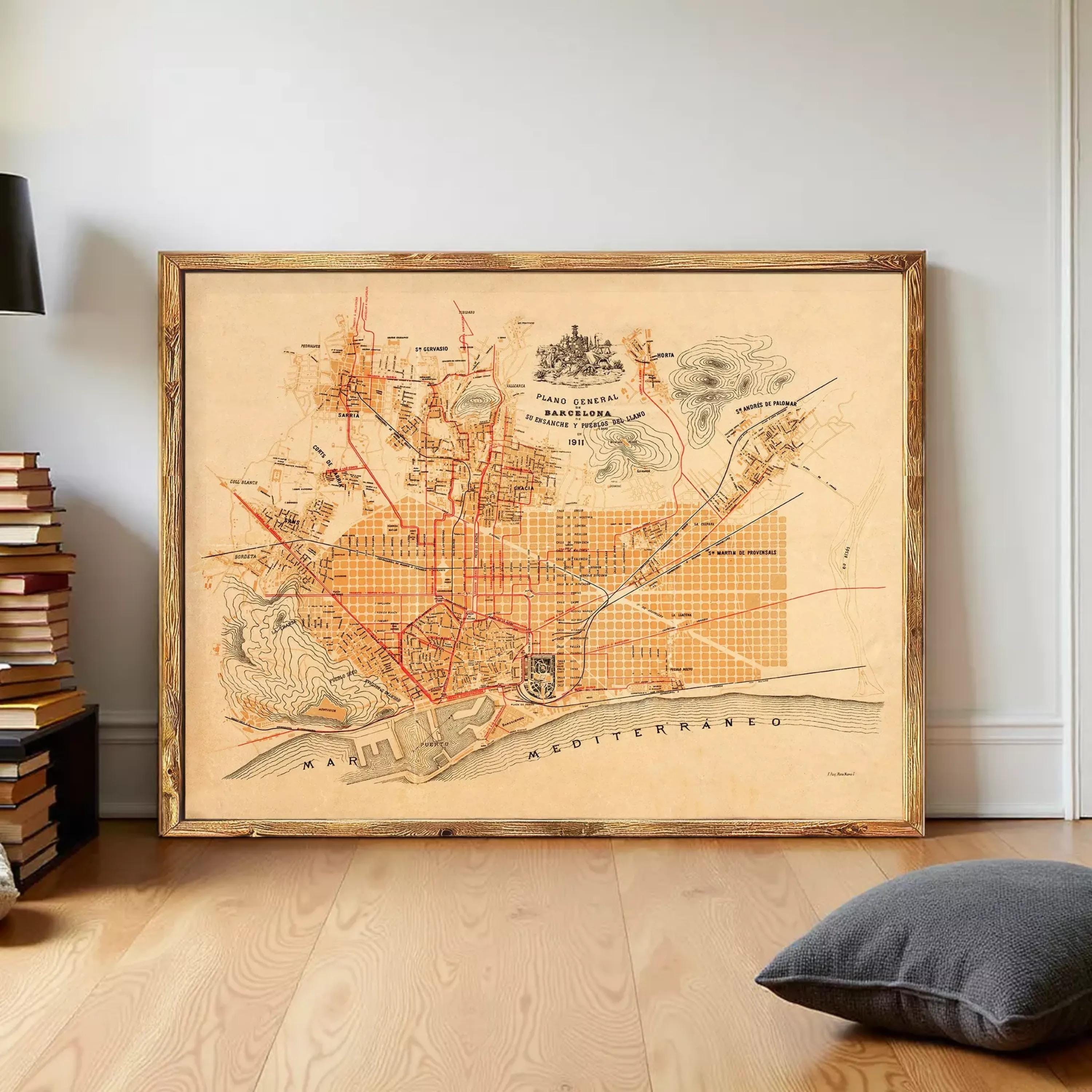 The image is a framed vintage map of Barcelona, Spain, depicting the city's streets and landmarks.
