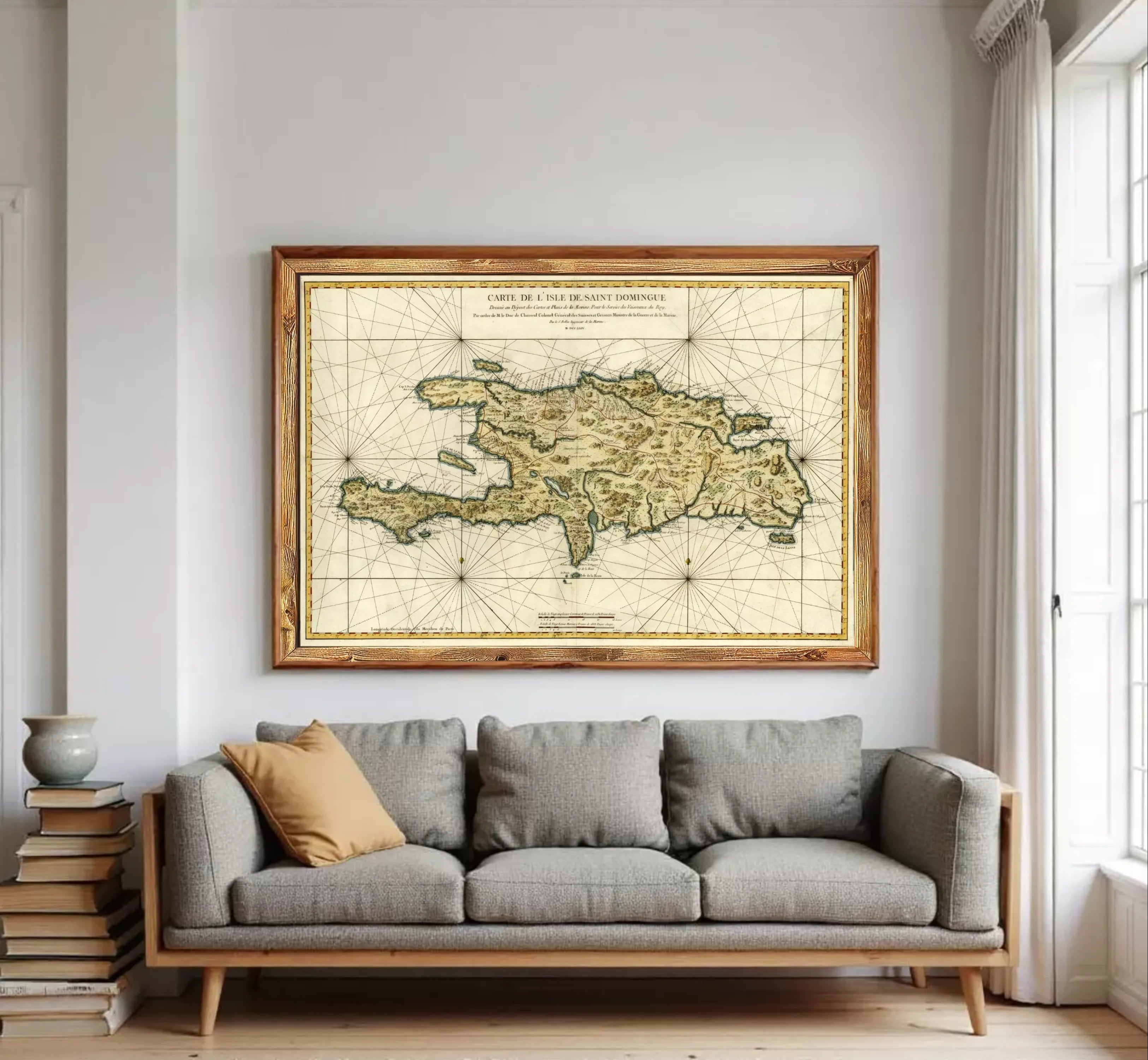 The image is a framed antique map of the island of St. Martin, showing the surrounding waters and landmasses.