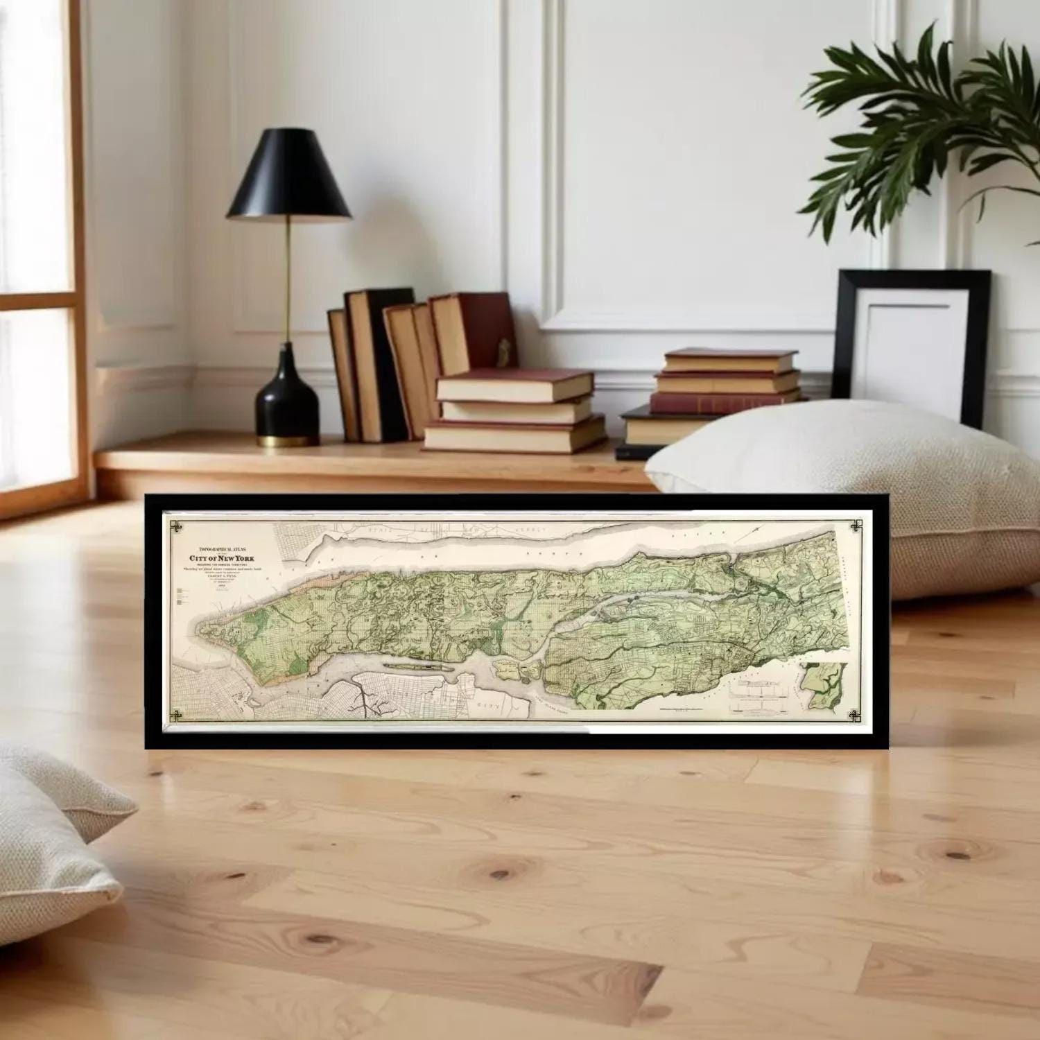 The image is a framed historical map of New York City, depicting the city's layout and surrounding areas.