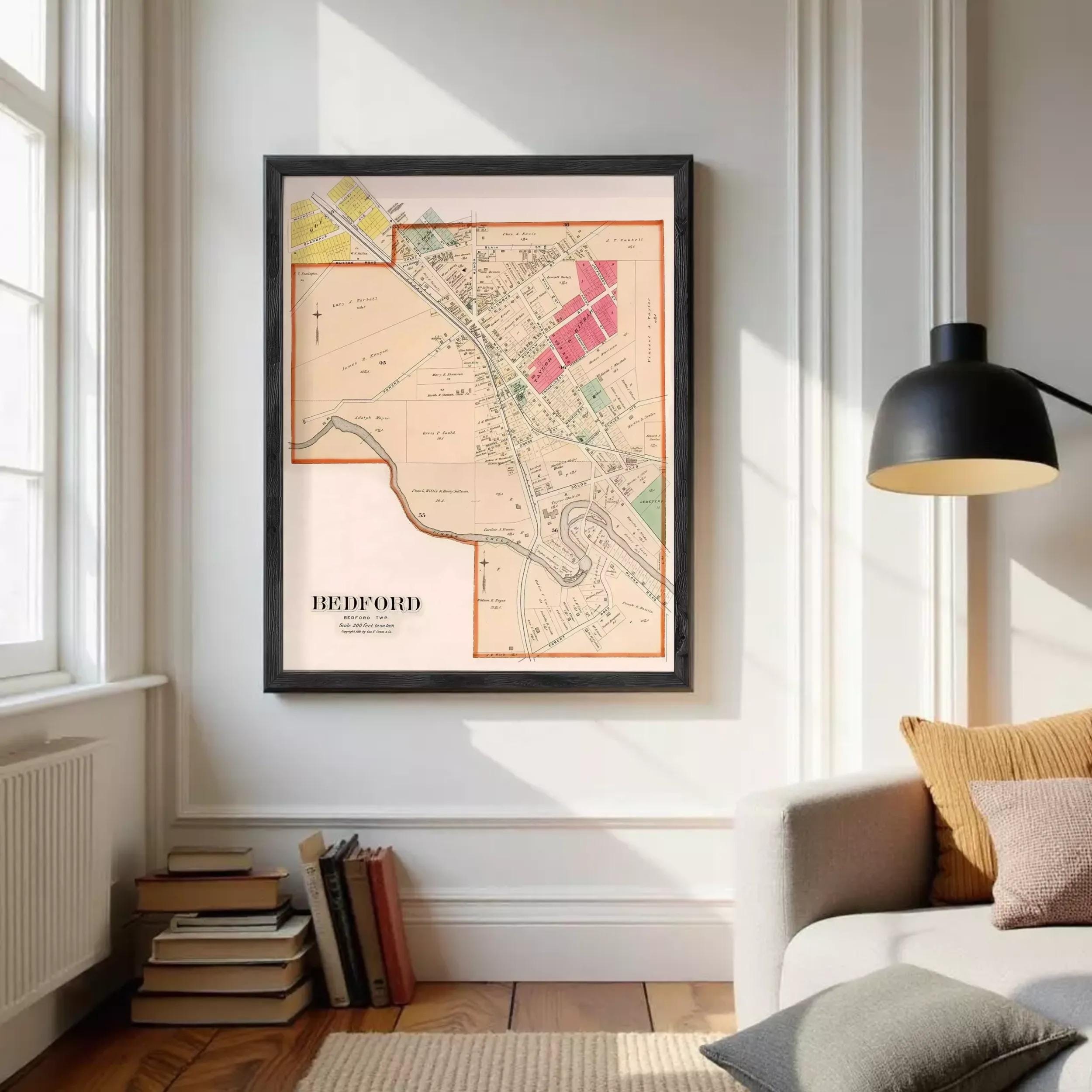 A framed map of Bedford, New Jersey, with various colored areas and streets labeled.