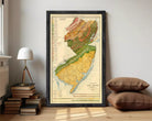 The image is a framed geological map of New Jersey, depicting the state's geographical features and boundaries.