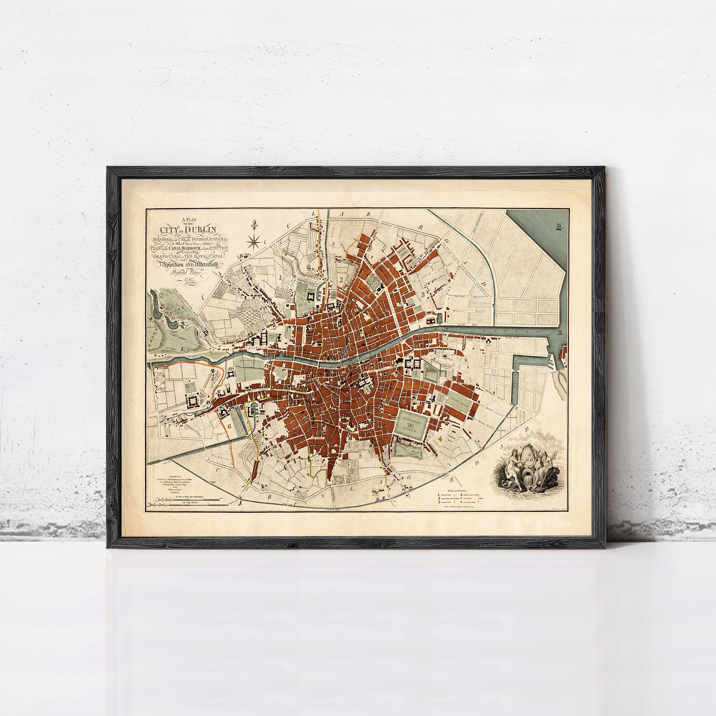The image is a framed map of the city of Dublin, Ireland, depicting the layout and surrounding areas.