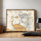 The image is a framed vintage map of Melbourne, Australia, depicting the city's layout and surrounding areas.