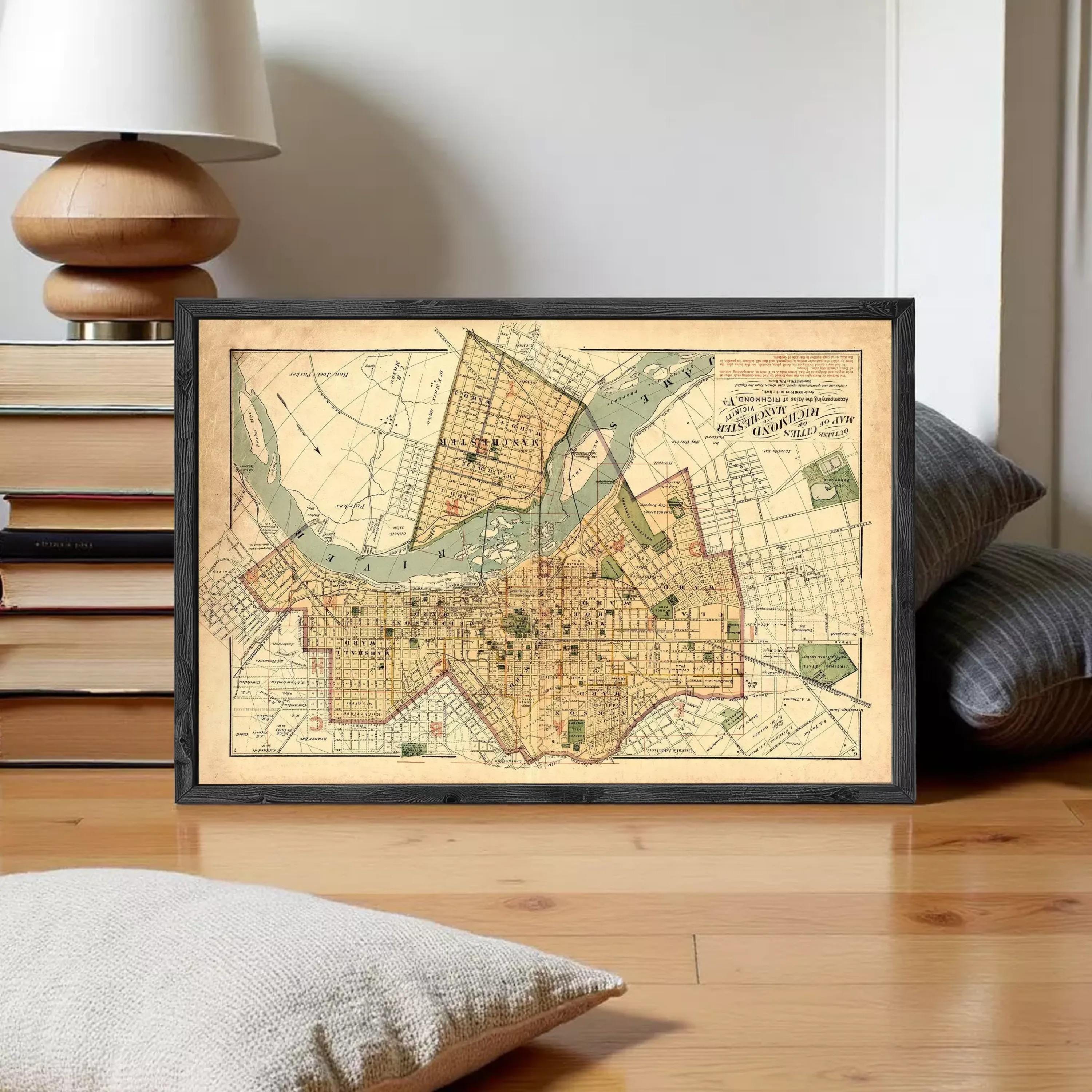 The image is a framed vintage map of a city, depicting streets, landmarks, and other geographical features.