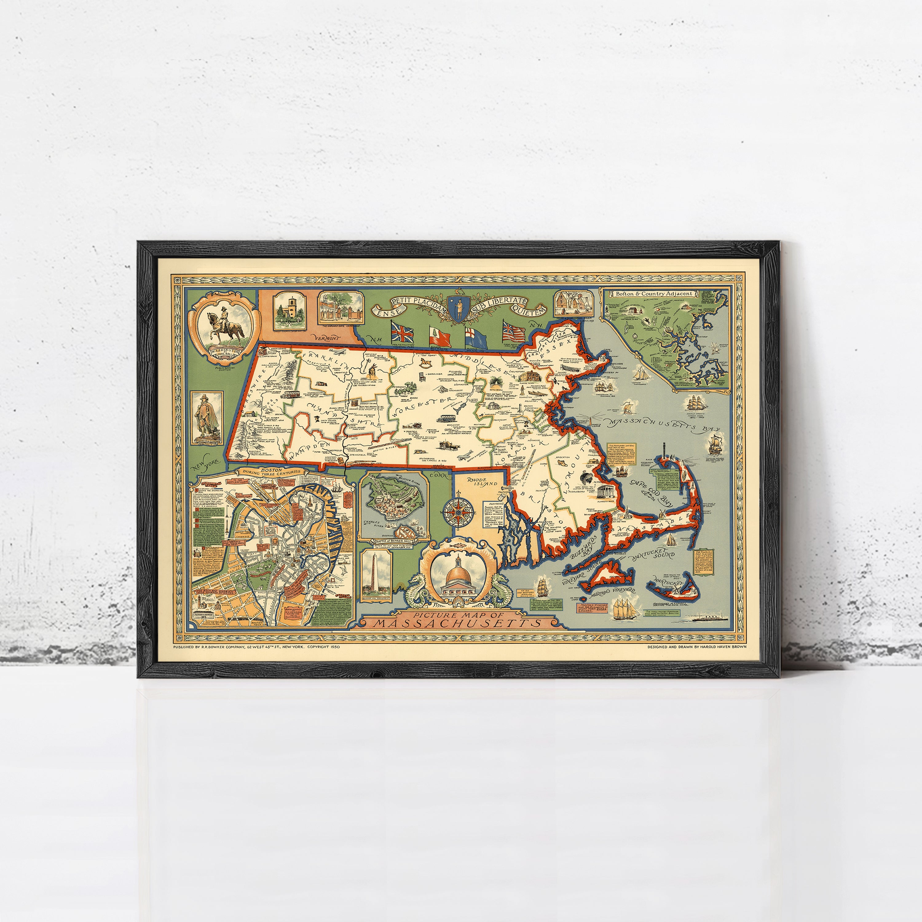 The image is a framed vintage map of the United States, depicting various regions and landmarks across the country.