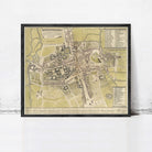 The image is a framed map of a city, likely from the 17th century, depicting a detailed layout of the streets, buildings, and other urban features.
