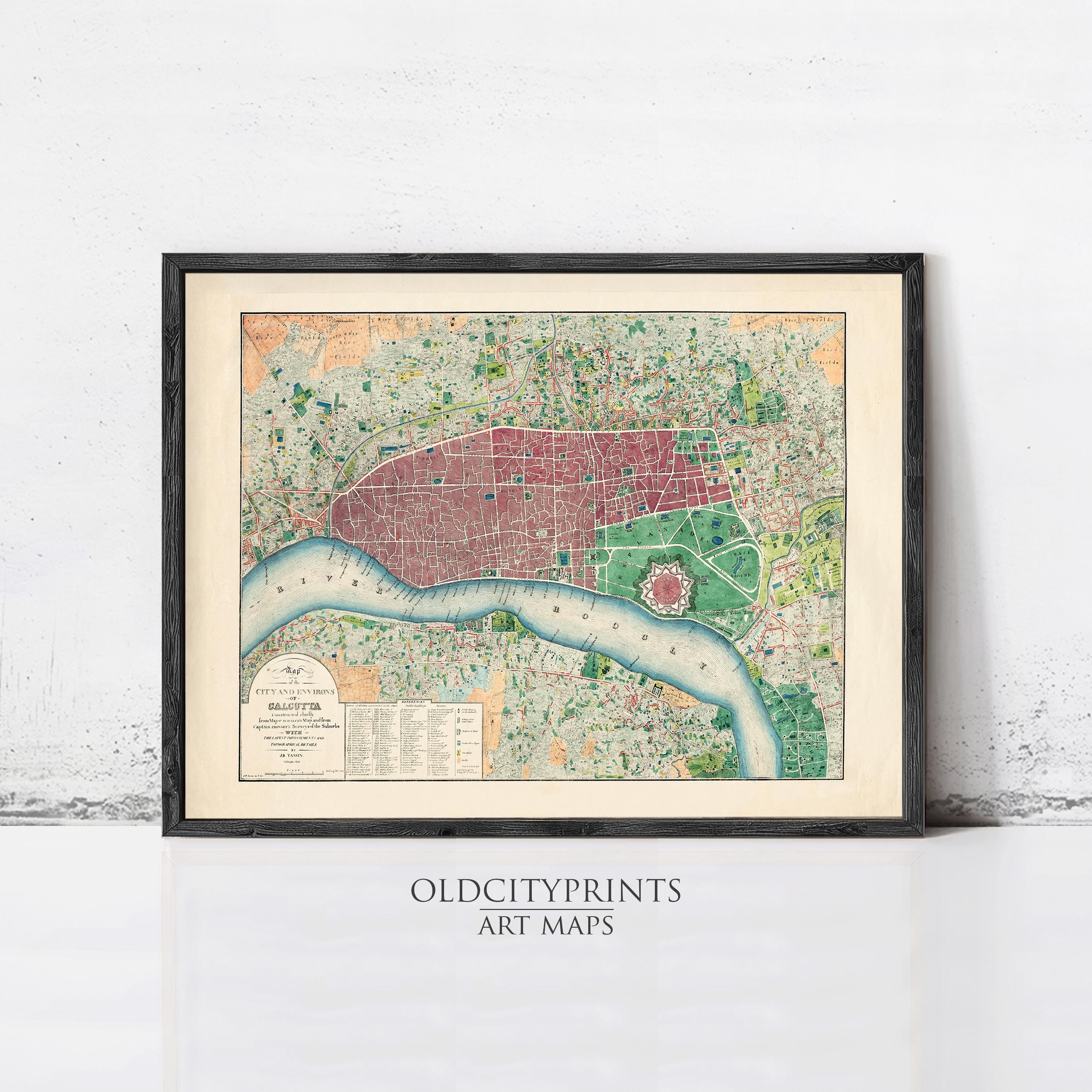 The image is a framed vintage map of London, England, depicting the city's streets and landmarks.