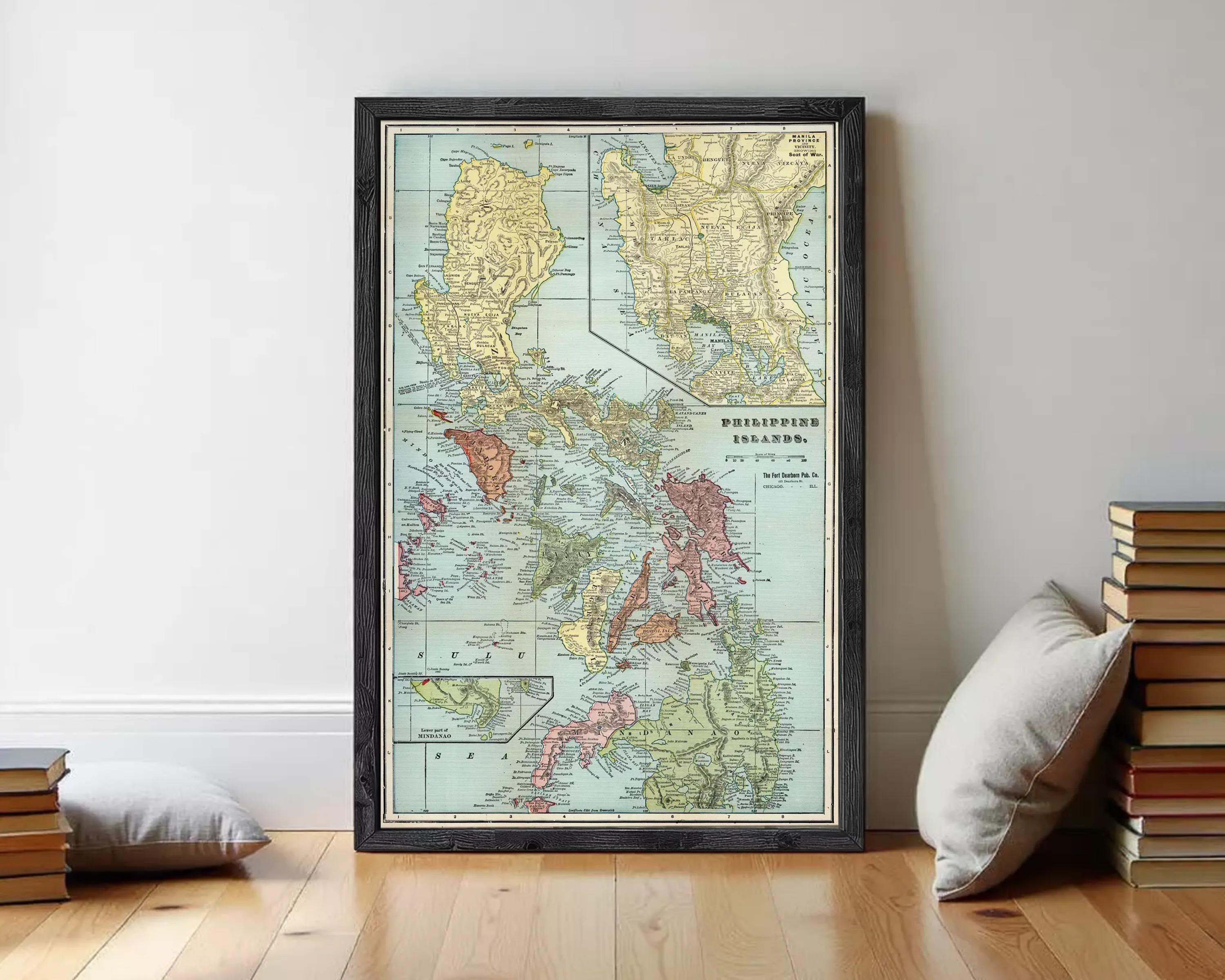 The image is a framed vintage map of the Philippines, showing the country's geographical layout and surrounding areas.