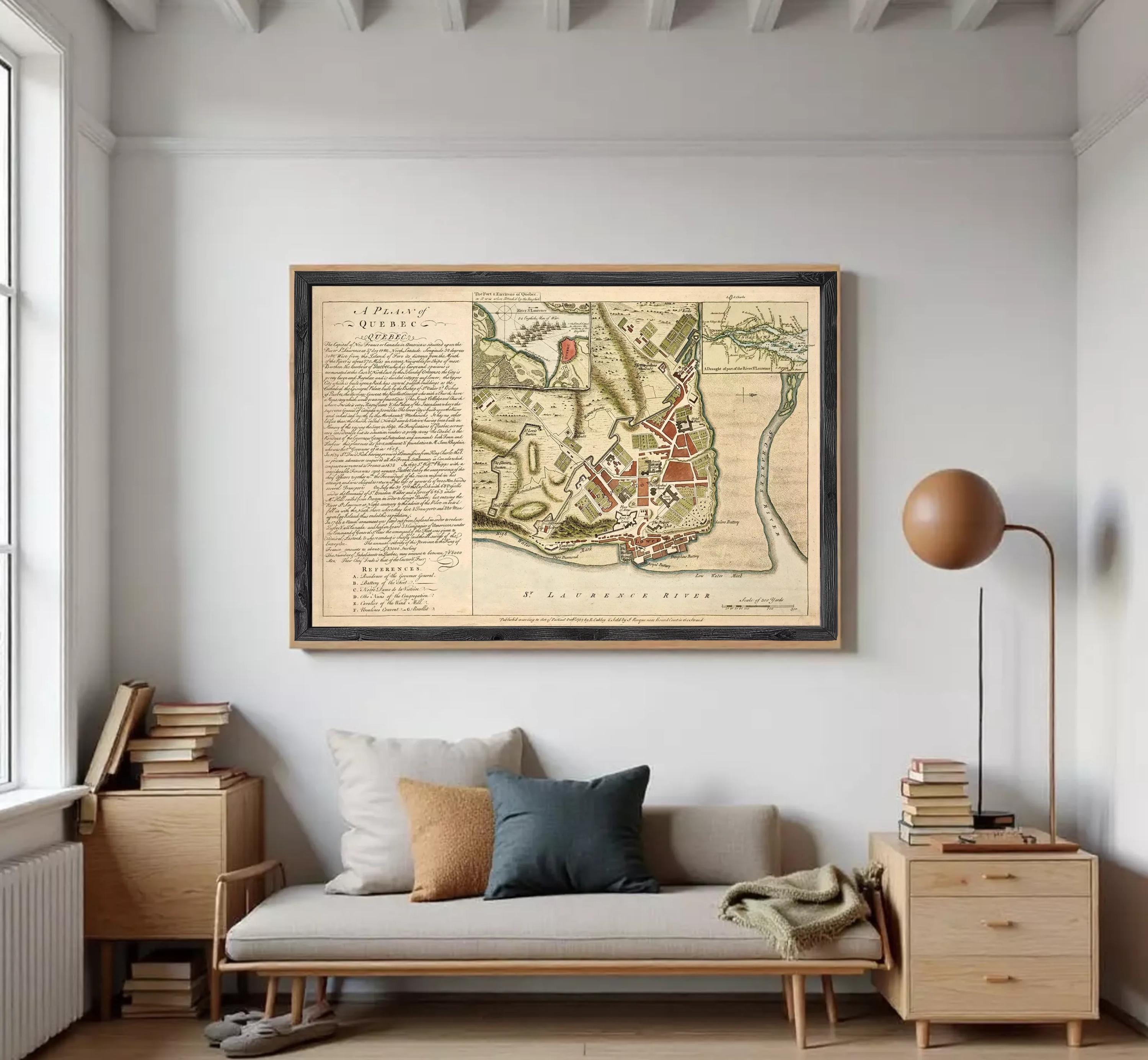 The image is a framed historical map of a city, likely from the 17th century, with detailed illustrations and labels.