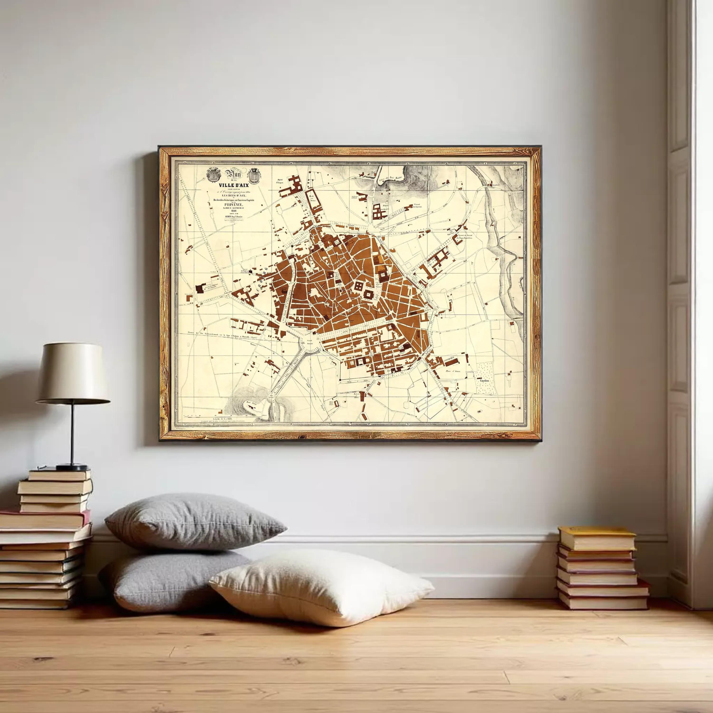 The image is a framed map of a city, likely a historical or geographical map, displayed on a wall.