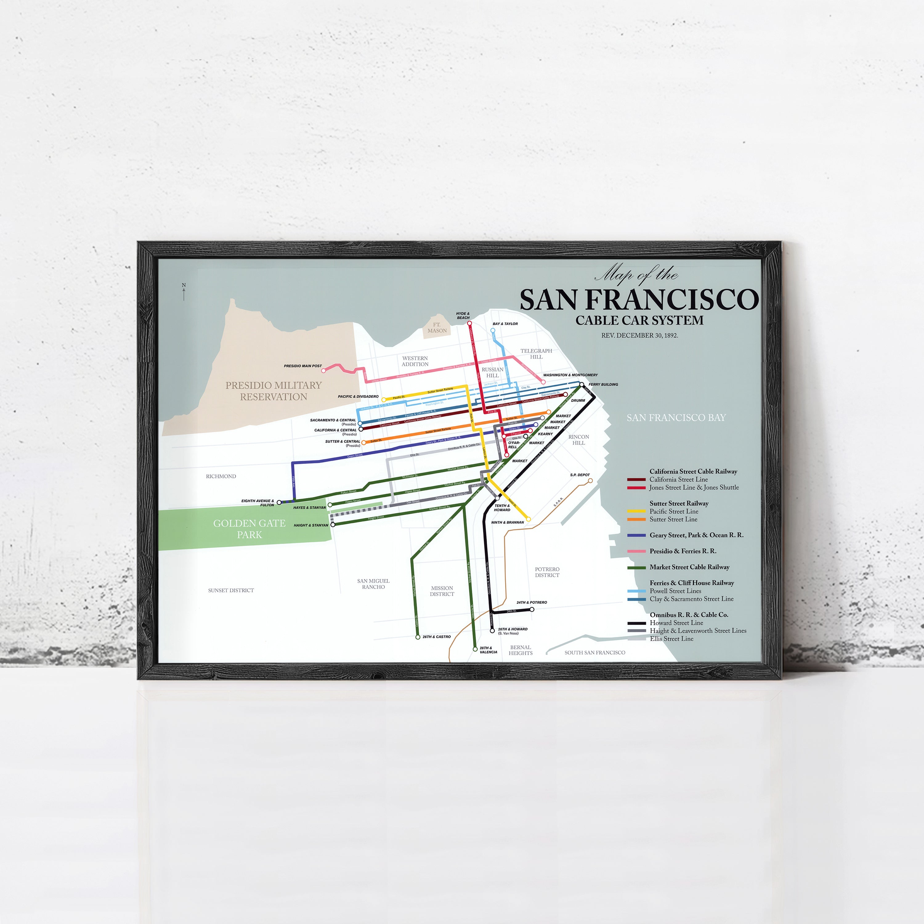The image is a framed map of the San Francisco Cable Car System, depicting the various cable car routes and stations in the city.