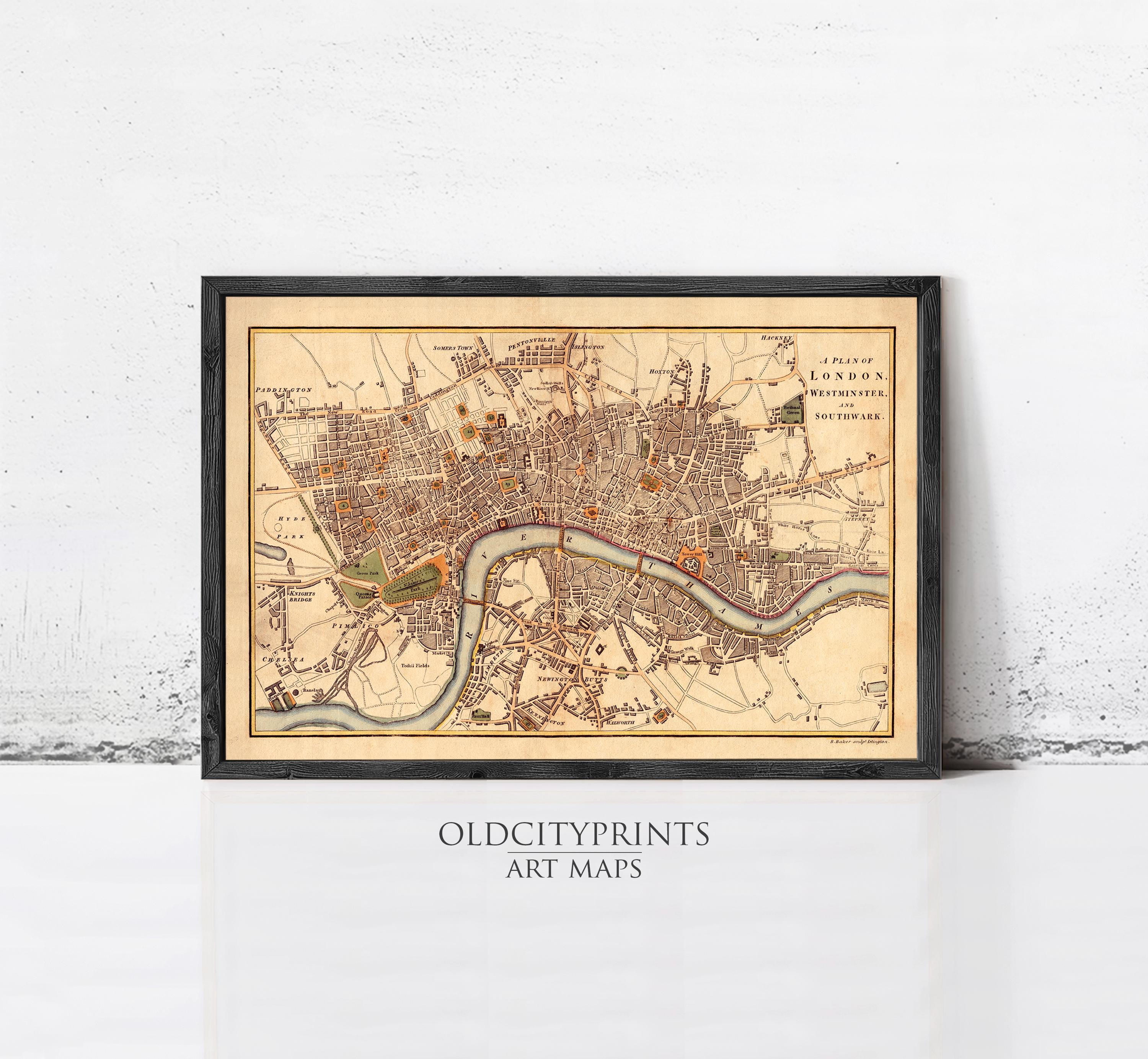 A framed antique map of London, England, dating back to the 16th century.