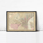 The image is a framed vintage map of Philadelphia, Pennsylvania, depicting the city's streets and neighborhoods.