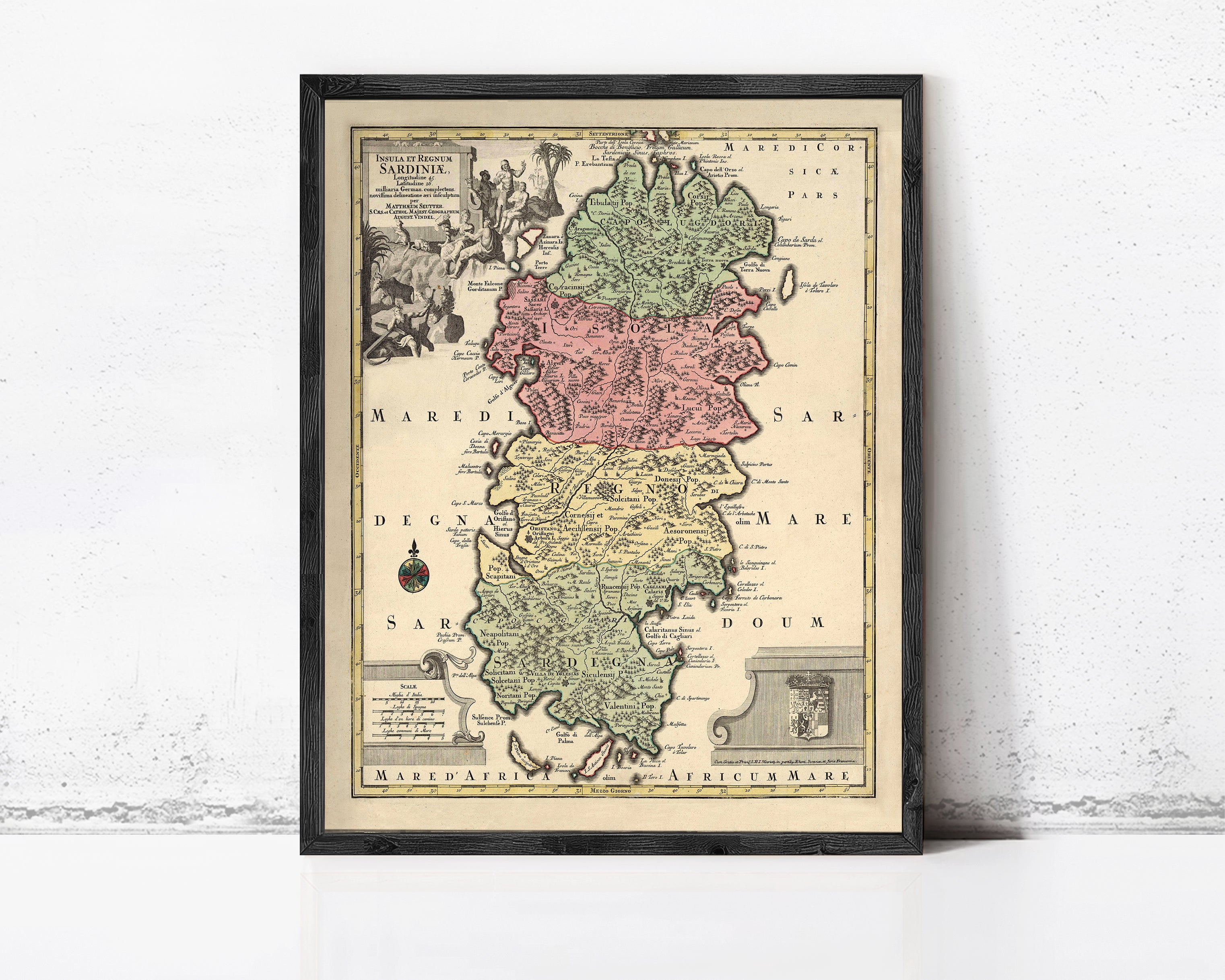 The image is a framed vintage map of Sardinia, Italy, depicting the island's geographical layout and surrounding areas.