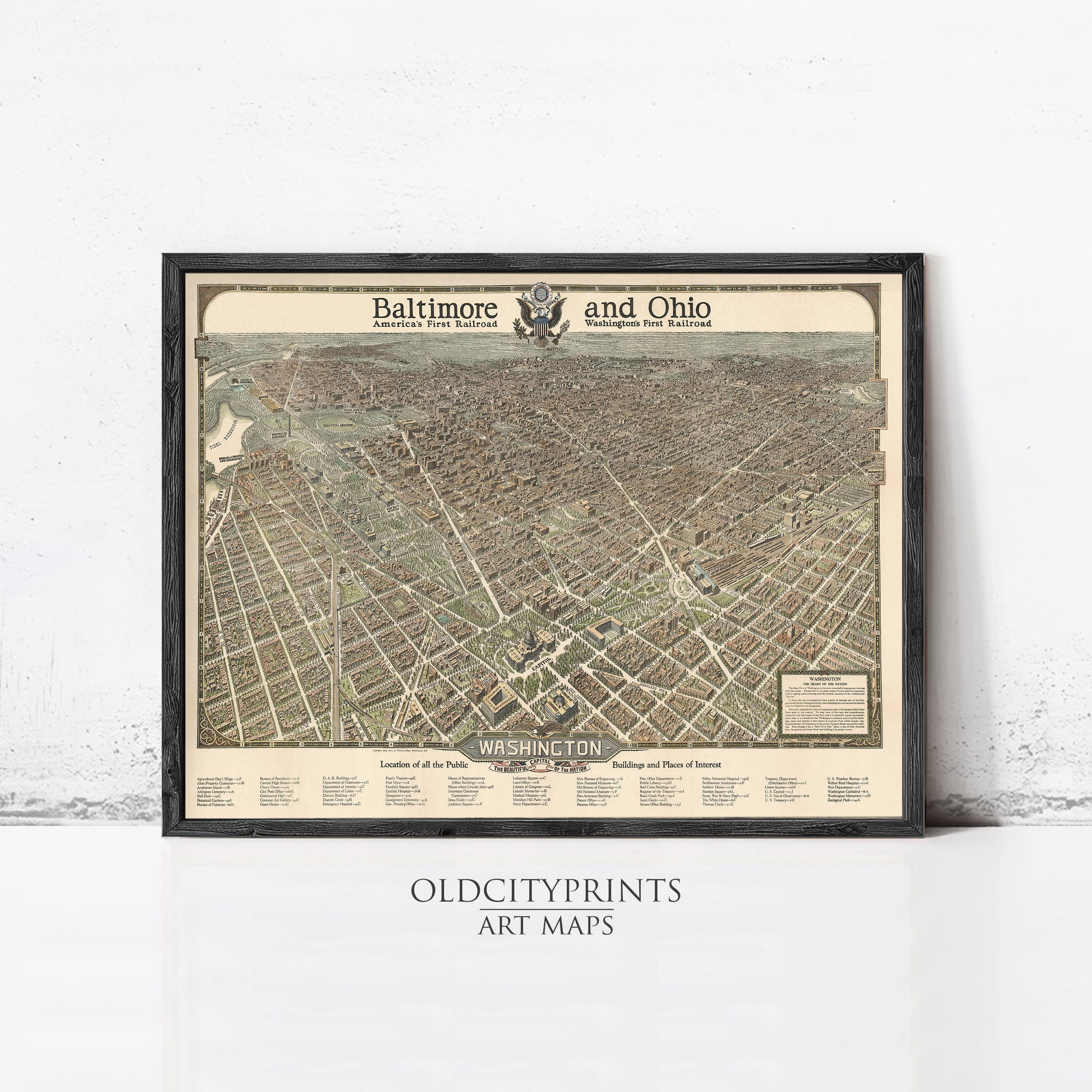 The image is a framed vintage map of Baltimore and Ohio, depicting the city's streets and surrounding areas.