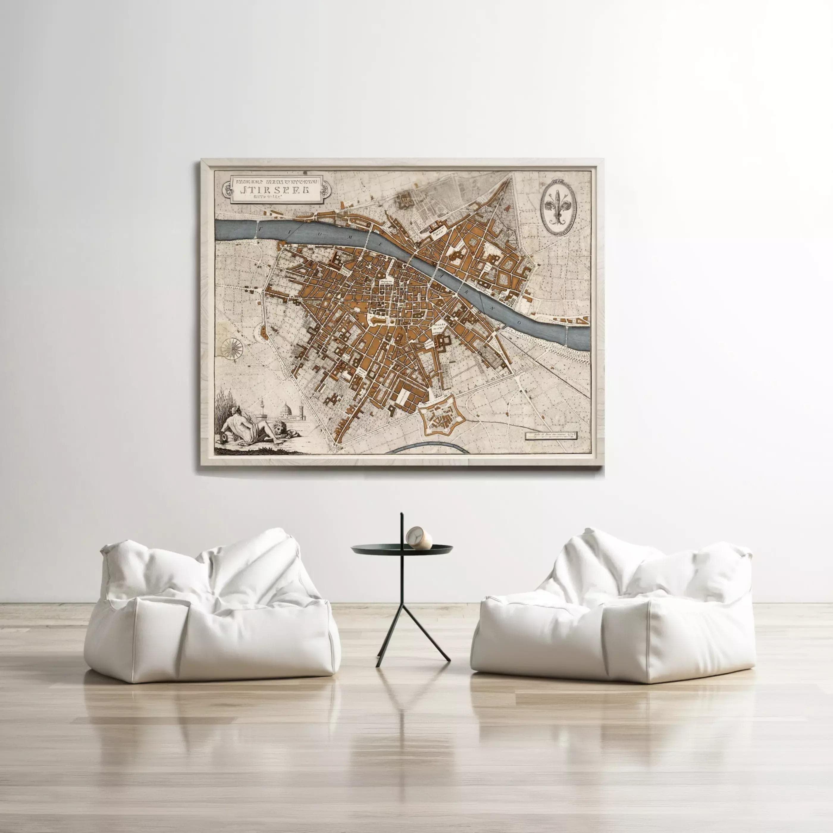 a large map of a city hanging on a wall, with two white bean bag chairs positioned in front of it.