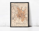The image is a framed map of a city, likely a historical or geographical map, with various streets, landmarks, and other geographical features depicted.