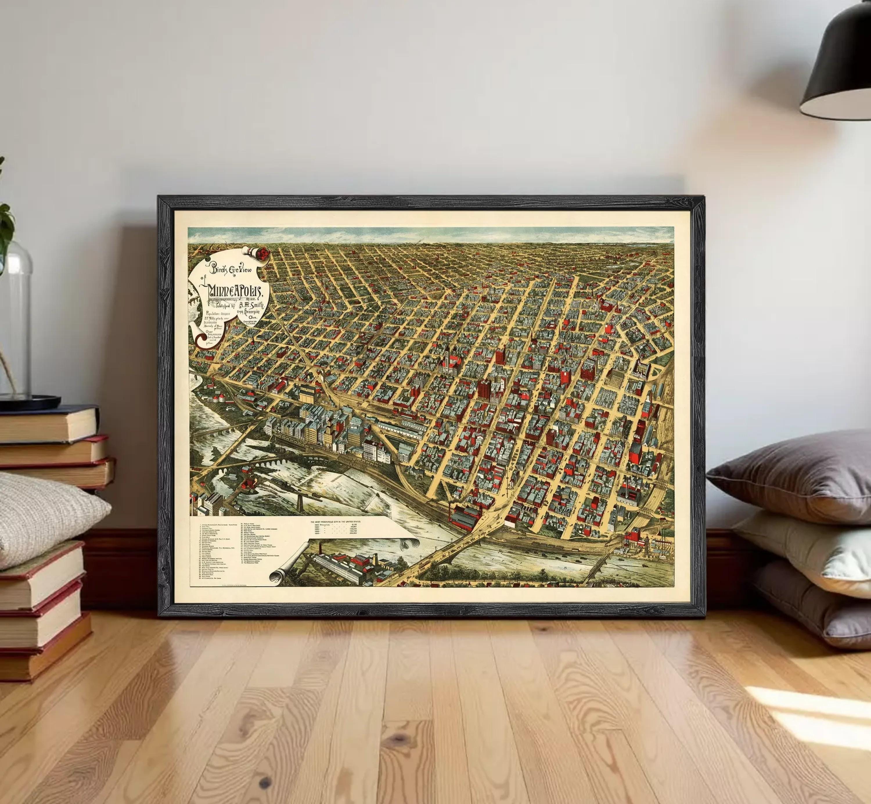 The image is a framed vintage map of a city, depicting a densely populated urban area with numerous buildings and streets.