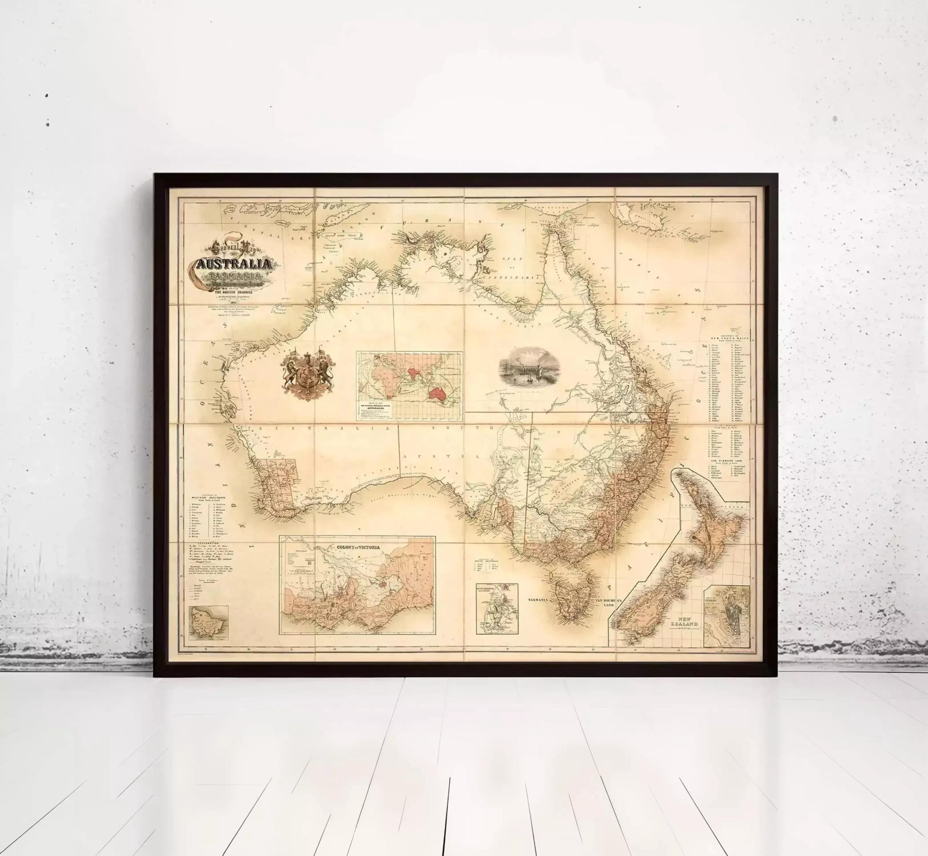 The image is a framed vintage map of Australia and New Zealand, depicting the geographical layout and boundaries of the two countries.
