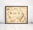 The image is a framed vintage map of Australia and New Zealand, depicting the geographical layout and boundaries of the two countries.