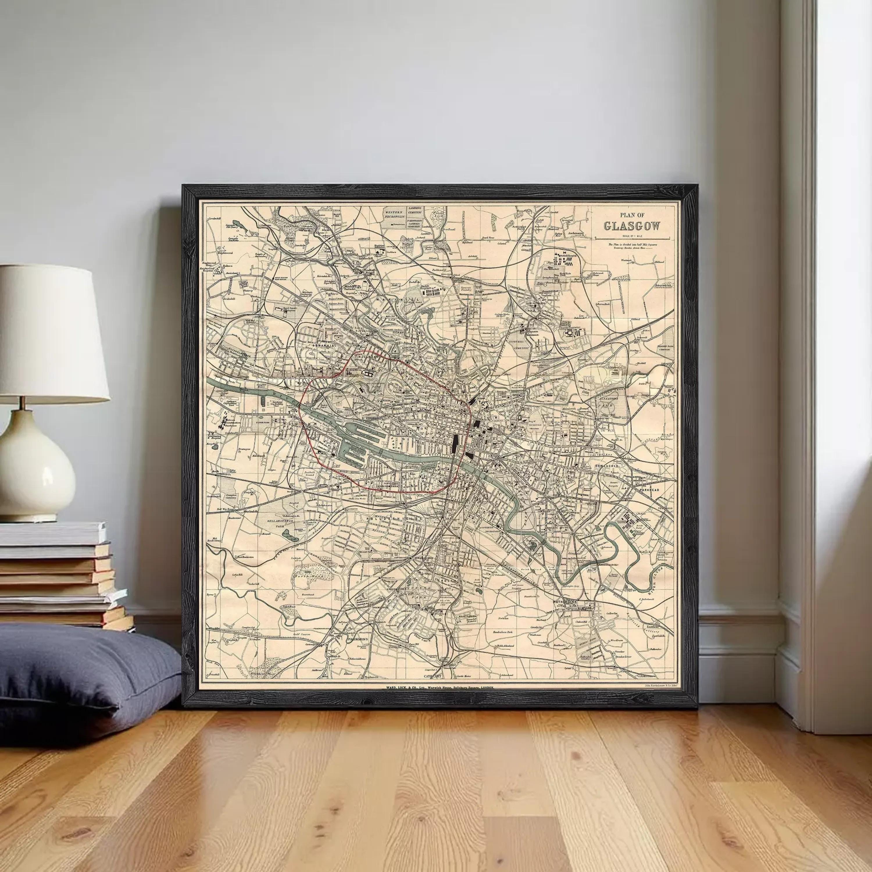 The image is a framed vintage map of Glasgow, Scotland, depicting the city's streets and landmarks in a detailed and intricate manner.