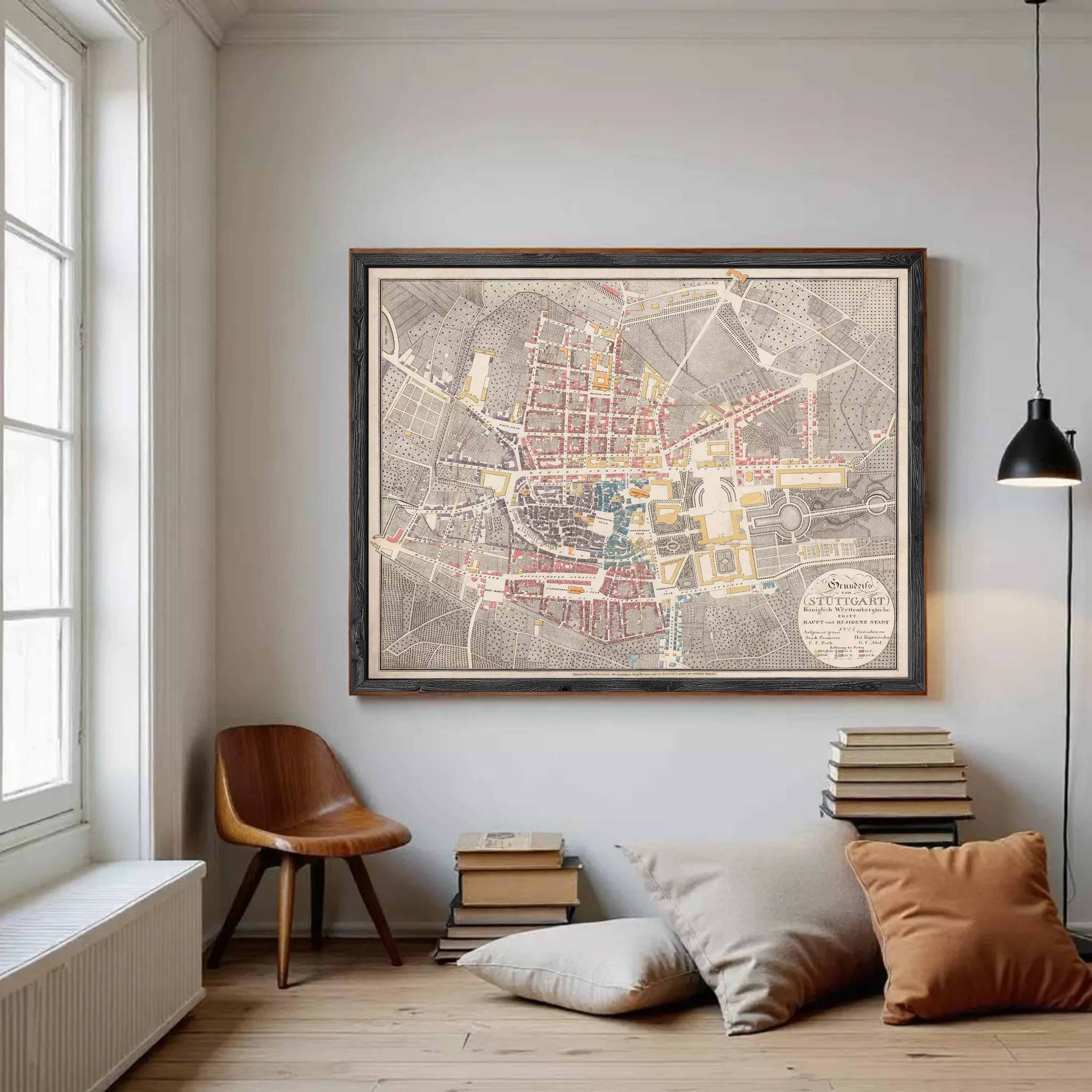 The image is a framed vintage map of Stuttgart, Germany, depicting the city's layout and streets.