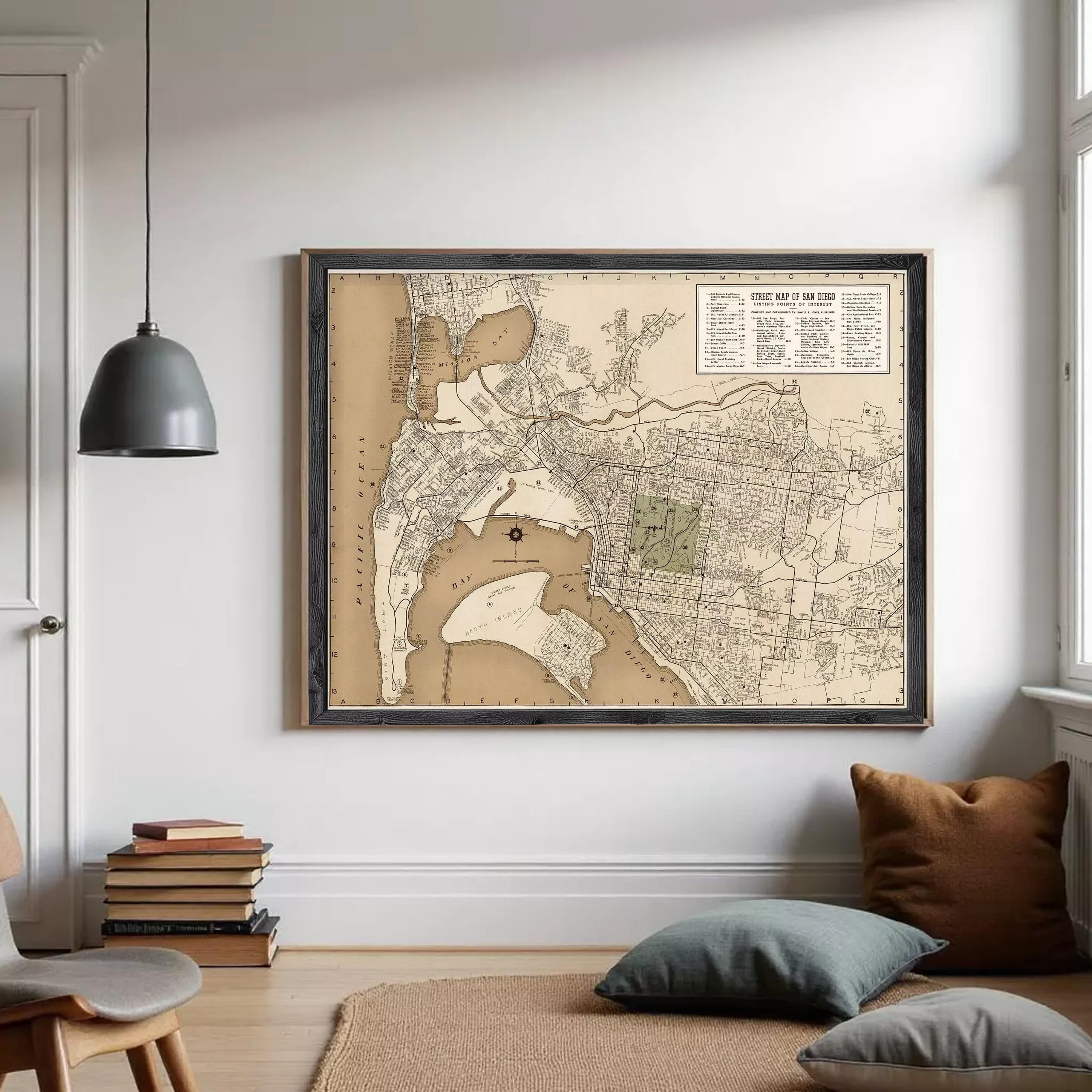 The image is a framed vintage map of San Diego, California, depicting the city's streets and surrounding areas.