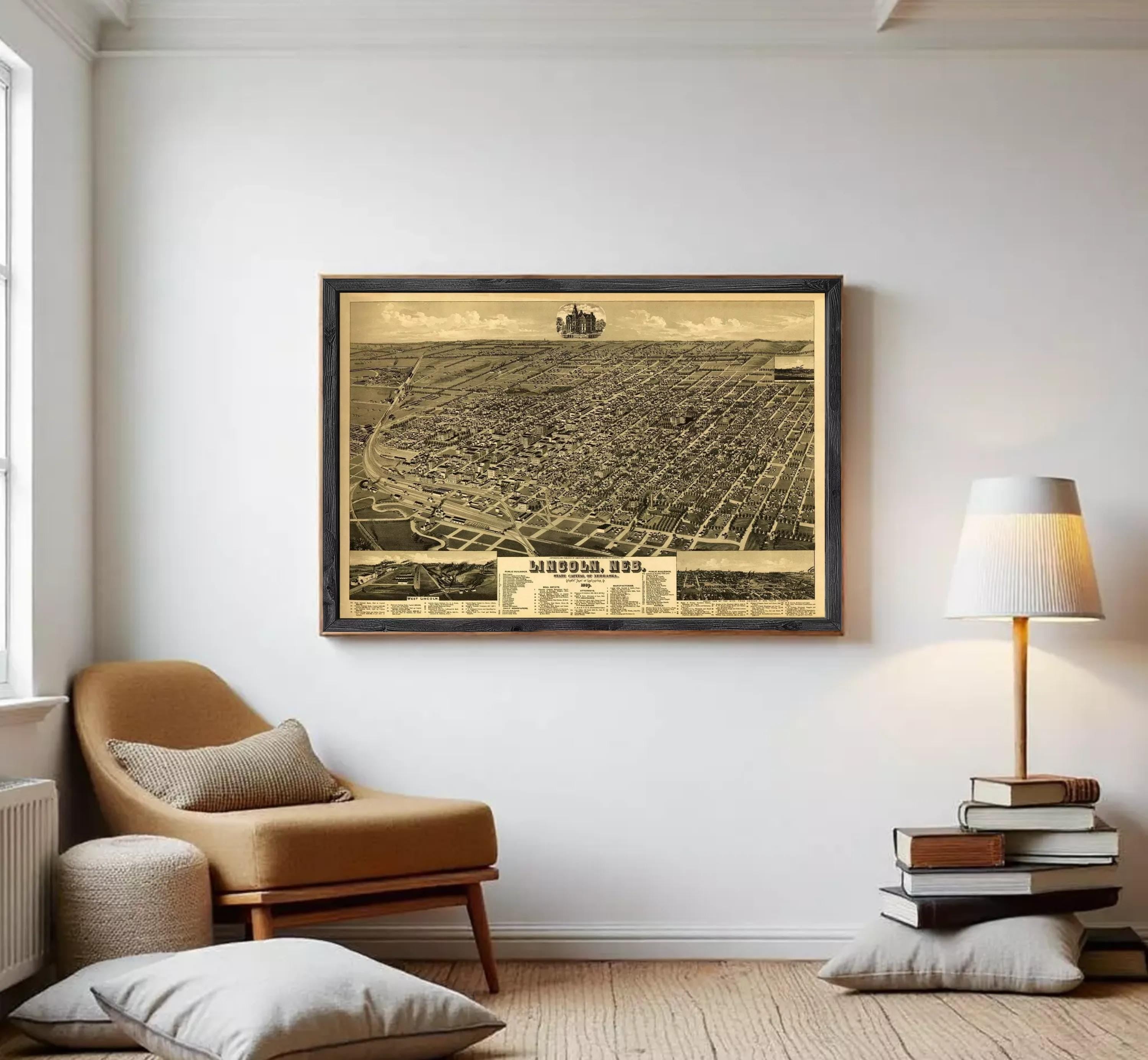 The image is a framed vintage map of a city, depicting a detailed aerial view of the urban landscape.