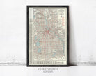 The image is a framed vintage map of Minneapolis, Minnesota, with a black border and a white background.