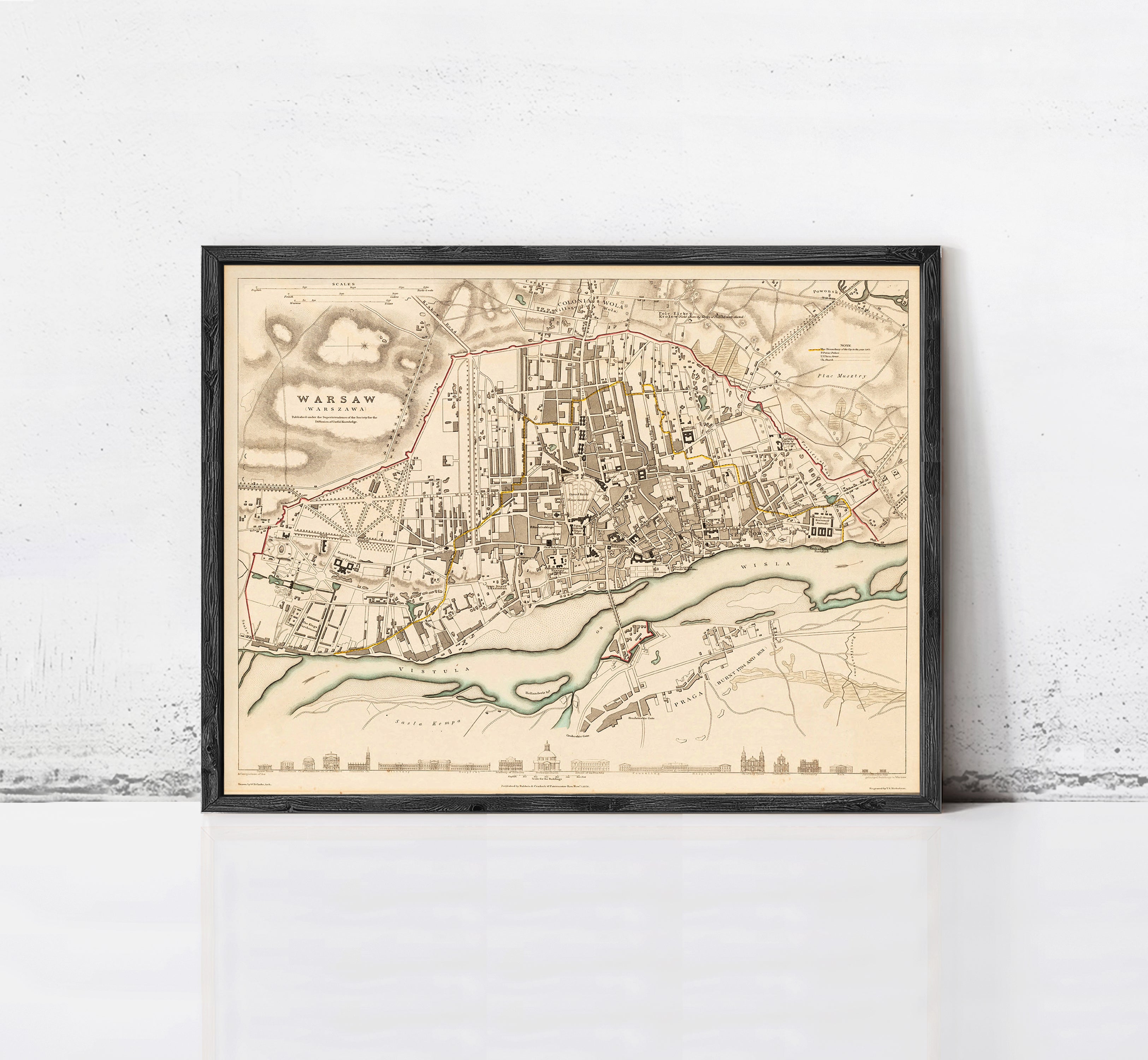 The image is a framed map of Warsaw, Poland, depicting the city's layout and surrounding areas.