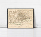 The image is a framed map of Warsaw, Poland, depicting the city's layout and surrounding areas.