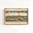 The image is a framed vintage map of Prague, Czech Republic, depicting the city's skyline and surrounding landscape.