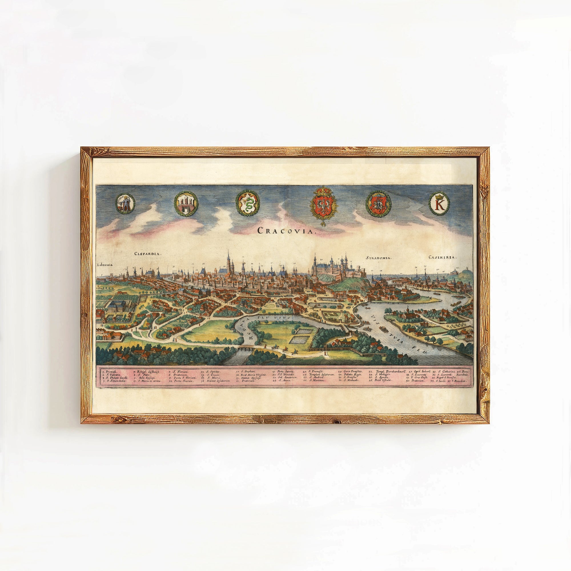 The image is a framed vintage map of Prague, Czech Republic, depicting the city's skyline and surrounding landscape.