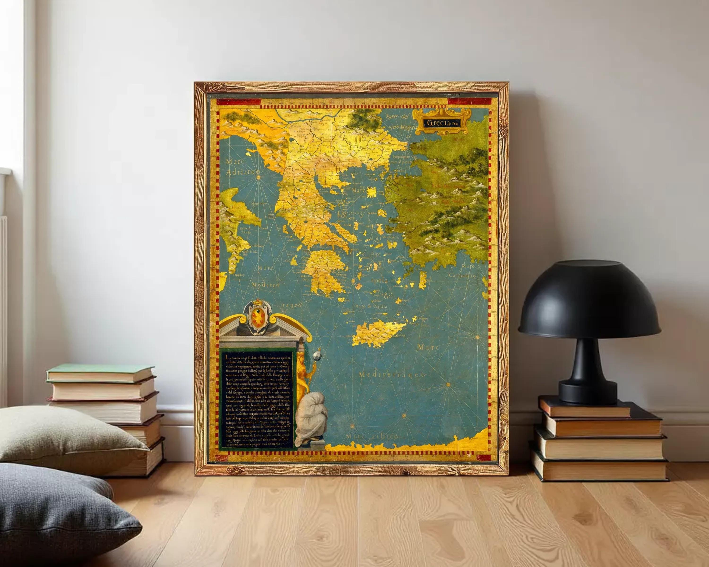 The image is a framed map of Greece, with a detailed and colorful depiction of the country's geography and surrounding areas.