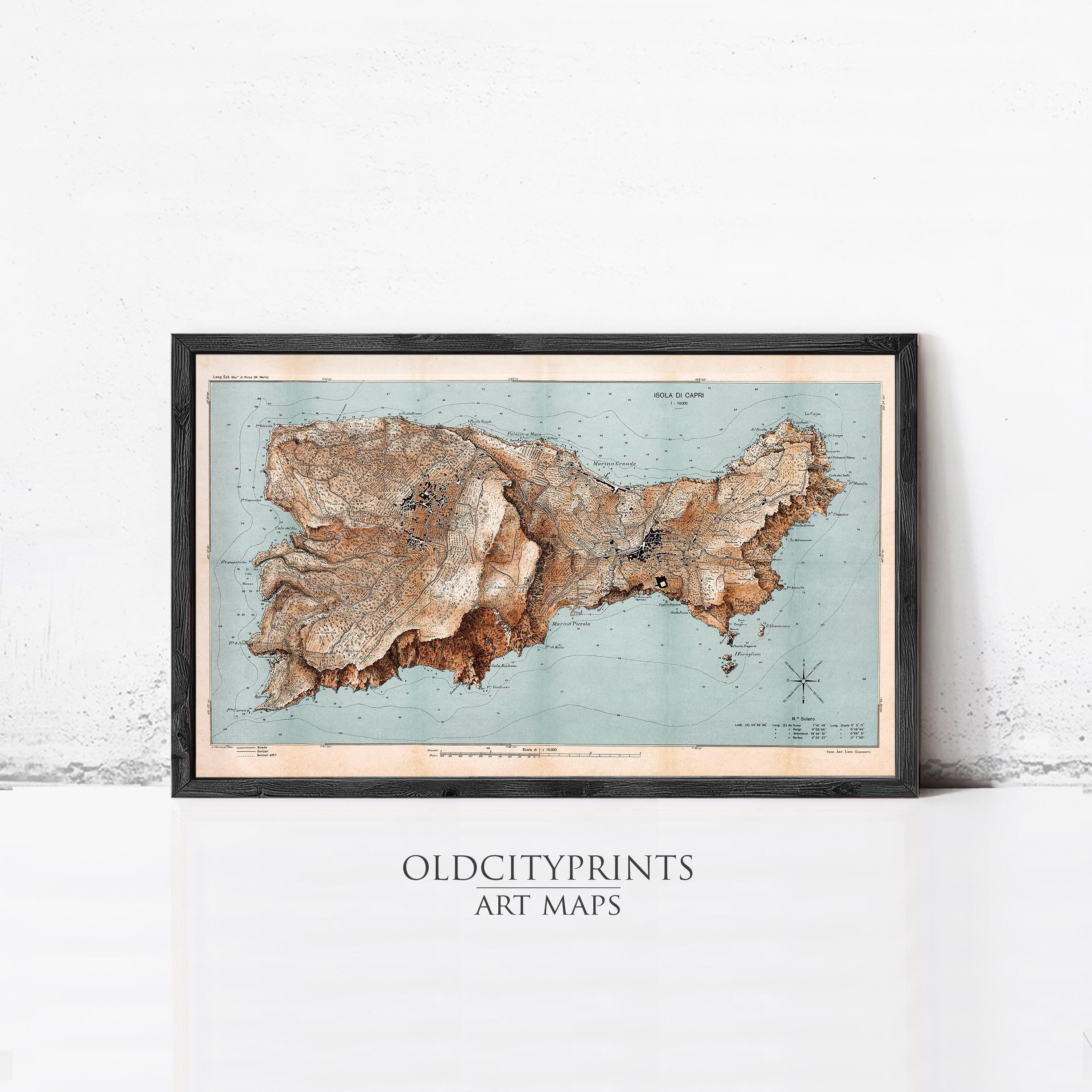 The image is a framed vintage map of a region, possibly a coastal area, with a light blue background and brown and orange landmasses.