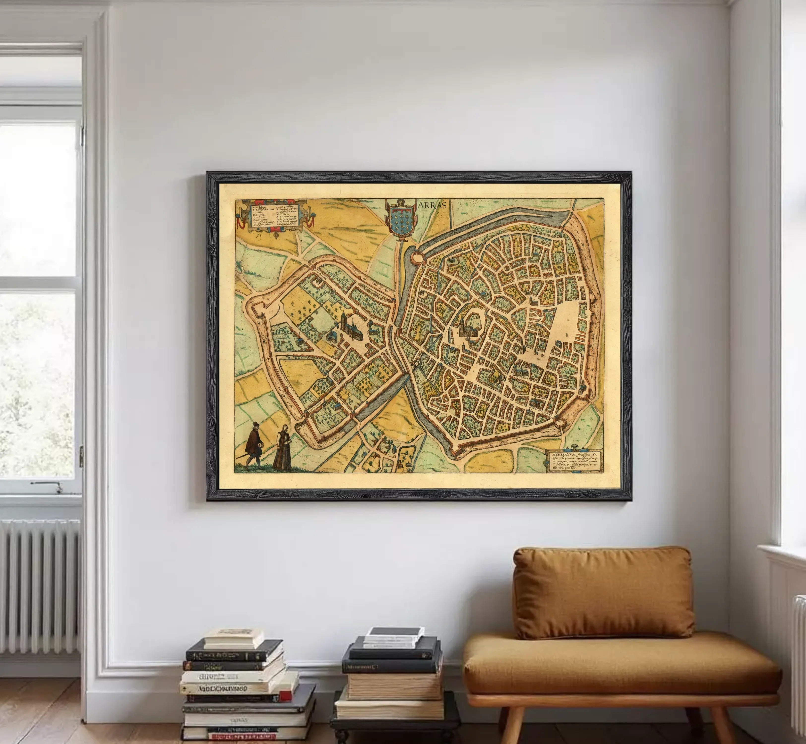 The image is a framed vintage map of a city, depicting a detailed layout of streets, buildings, and other urban features.
