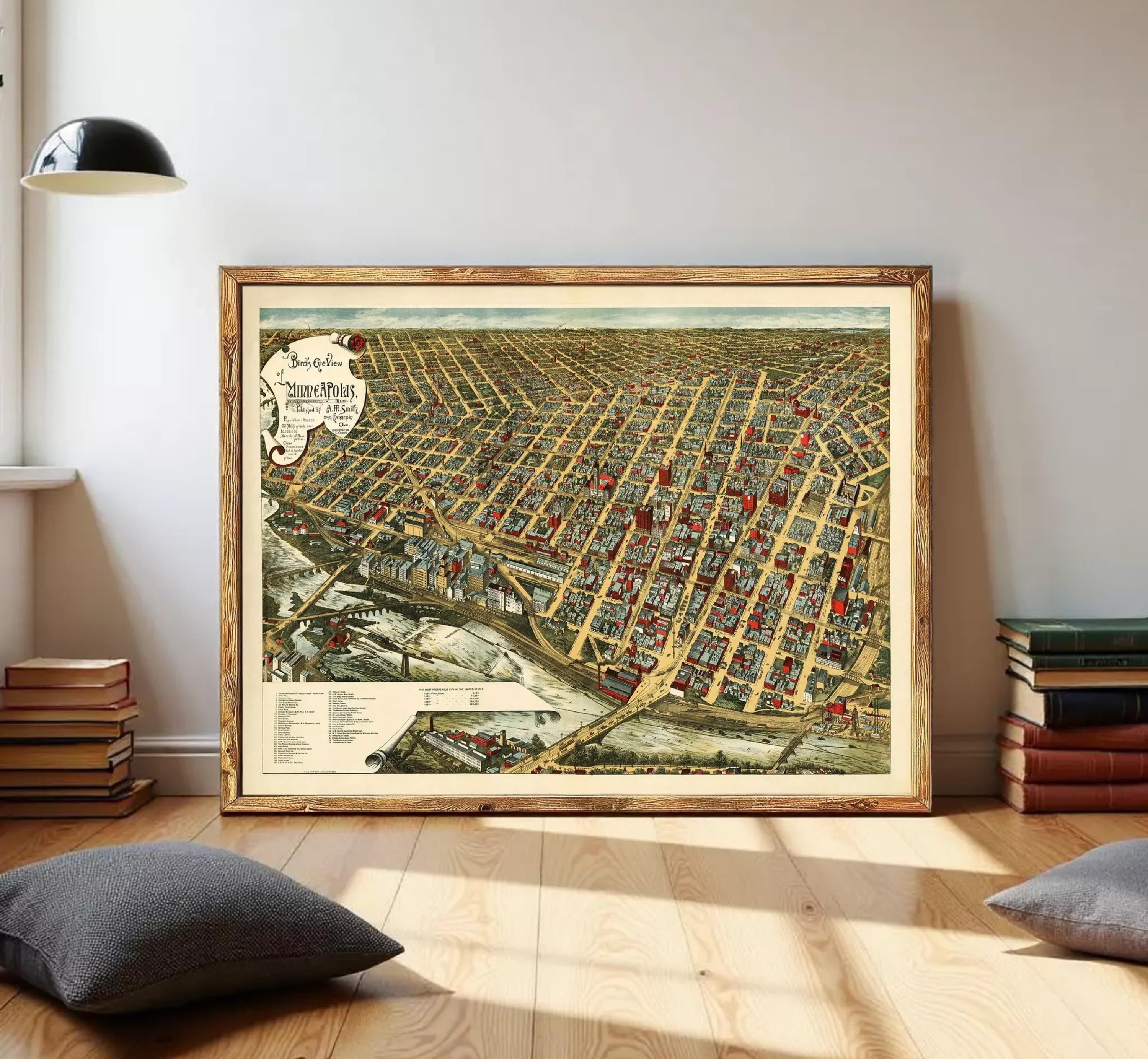 The image is a framed vintage map of a city, depicting a densely populated urban area with numerous buildings and streets.