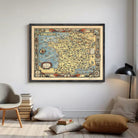 The image is a framed vintage map of France, featuring intricate illustrations and detailed geographical information.