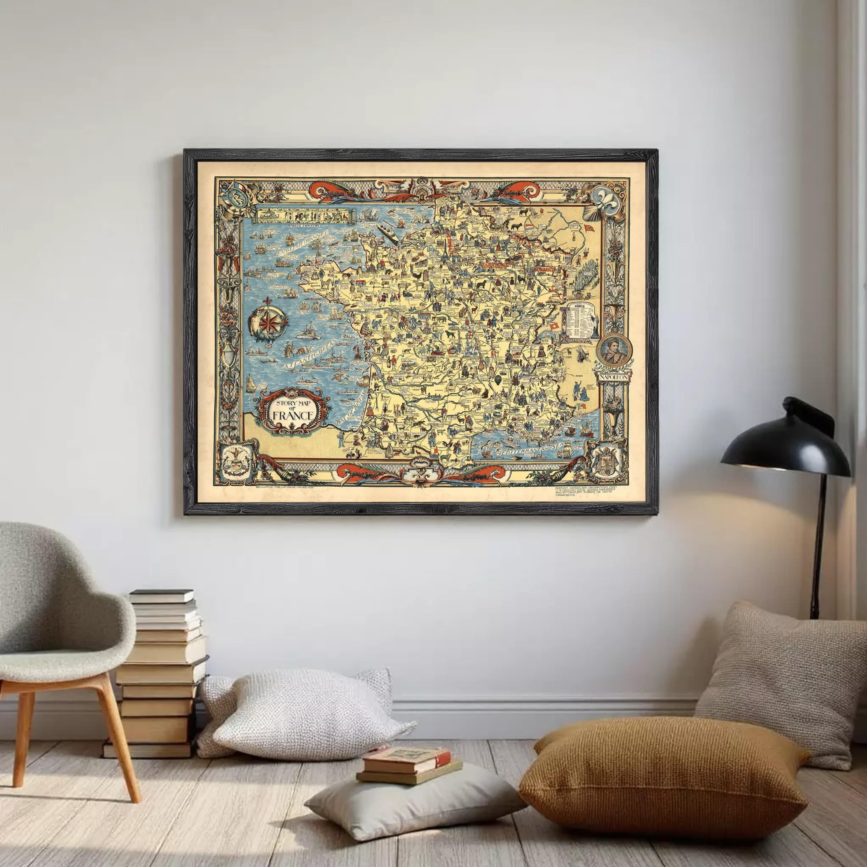 The image is a framed vintage map of France, featuring intricate illustrations and detailed geographical information.