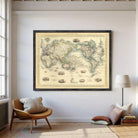 The image is a framed vintage world map depicting the continents and oceans in a detailed and intricate manner.
