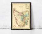 The image is a framed vintage map of Tasmania, Australia, depicting the state's geographical layout and boundaries.