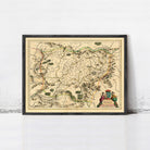 The image is a framed antique map of a region, likely from the 16th century, with detailed geographical markings and illustrations.