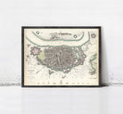 The image is a framed historical map of Antwerp, Belgium, depicting the city's layout and surrounding areas.