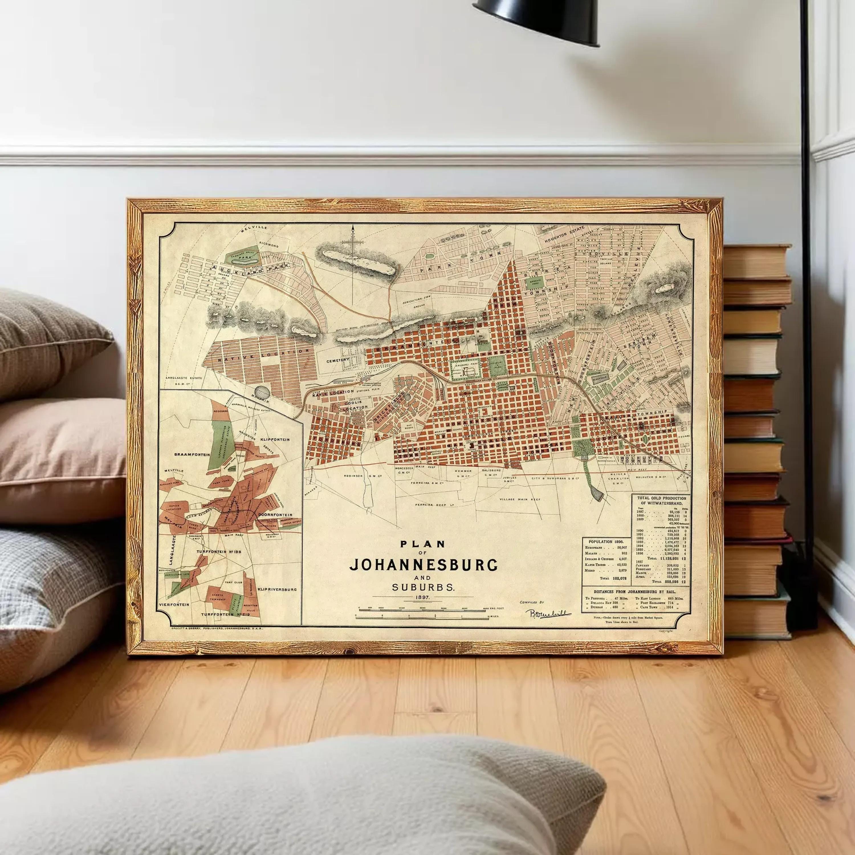a framed map of Johannesburg, South Africa, with a wooden frame and a vintage appearance.
