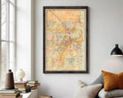 The image is a framed vintage map of the city of Sydney, Australia, depicting the city's streets and surrounding areas.
