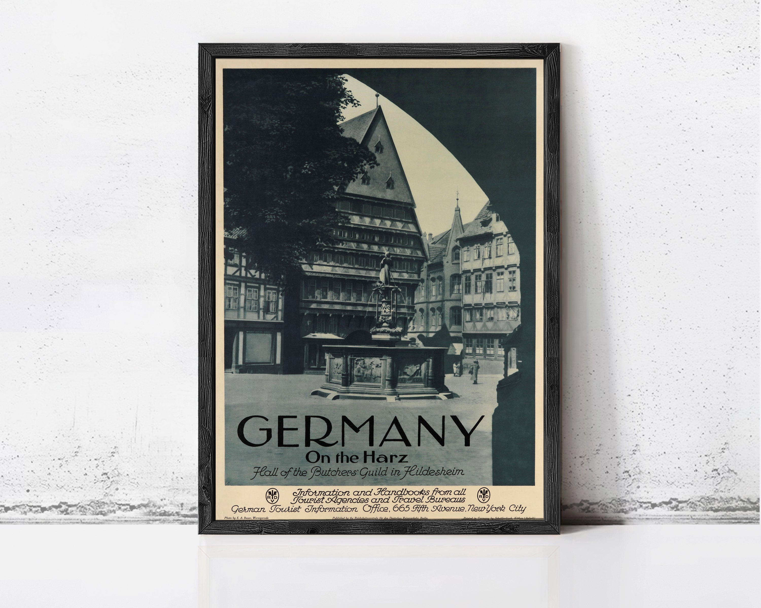 The image is a framed vintage poster advertising a tour of Germany on the horizon.