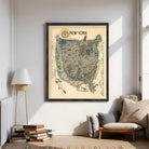 The image is a framed vintage map of New York, depicting various landmarks and locations within the city.