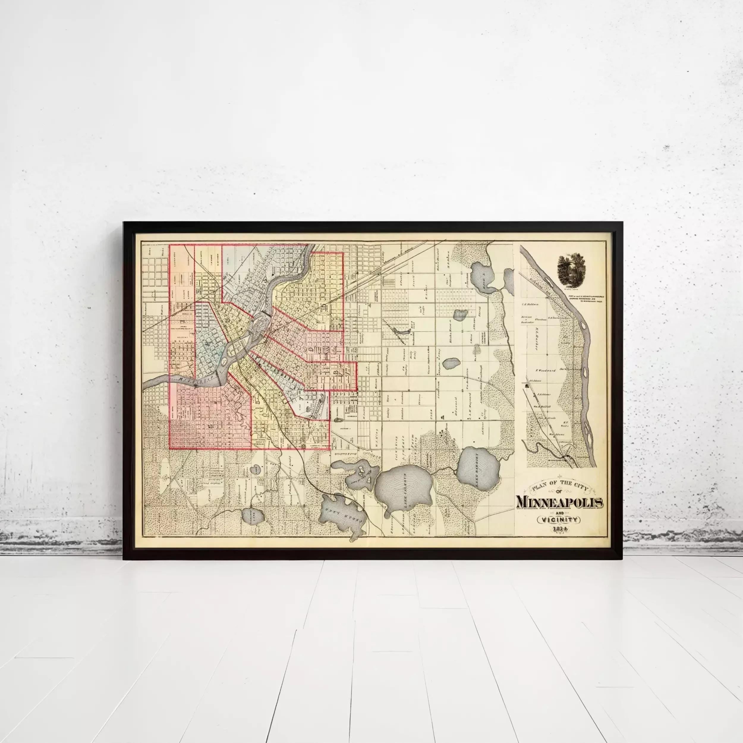 The image is a framed map of Minneapolis, Minnesota, dated 1883.