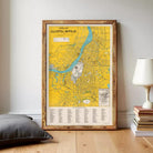 a framed map of Calcutta, India, with a yellow and blue color scheme. The map displays various landmarks and locations within the city.