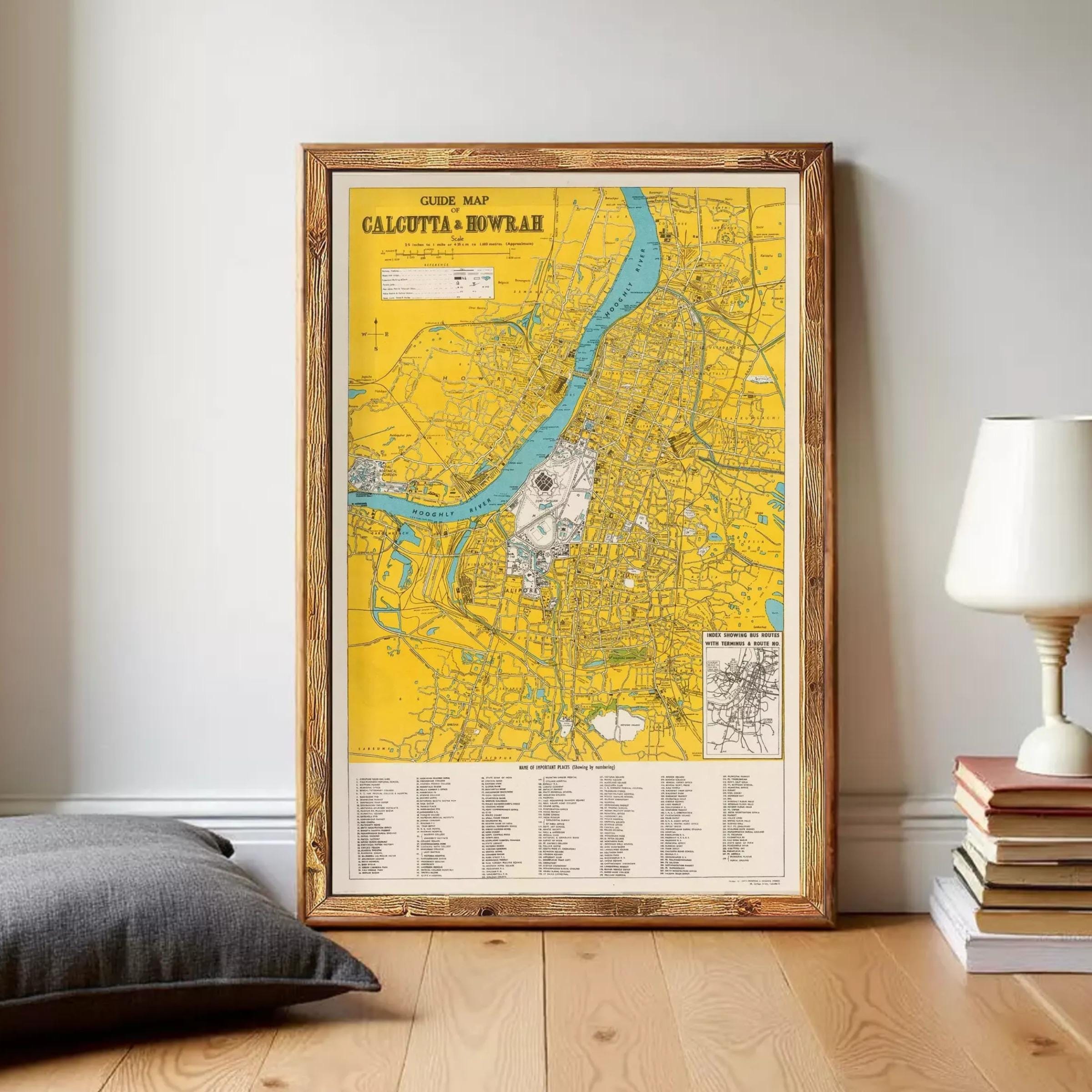 a framed map of Calcutta, India, with a yellow and blue color scheme. The map displays various landmarks and locations within the city.